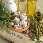 An arrangement of olives on textile surface — Stock Photo