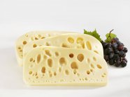 Three slices of Leerdammer cheese — Stock Photo