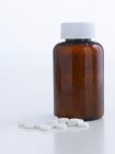 Tablets in a dispensing bottle — Stock Photo