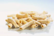 Fresh raw homemade rigatoni pasta — Stock Photo