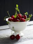 Bowl of sour cherries — Stock Photo