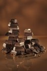 Stacked dark chocolate — Stock Photo