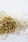 Brown and white basmati rice — Stock Photo