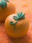 Pumpkin-shaped sweet for Halloween — Stock Photo