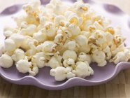 Fried Popcorn on plate — Stock Photo