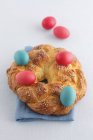 Bread with Easter eggs — Stock Photo