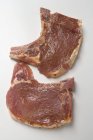 Raw marinated pork chops — Stock Photo