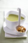Pea soup with Parmesan balls — Stock Photo