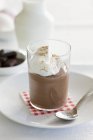 Chocolate pudding with whipped cream — Stock Photo