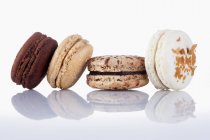 Four different macaroons — Stock Photo