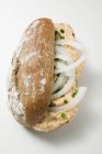 Bread roll filled Obatzda — Stock Photo