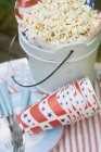Popcorn in a wooden bucket — Stock Photo