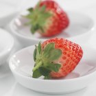 Fresh strawberries with stalks — Stock Photo