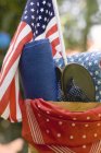 Daytime view of decorations for the 4th of July in a crate — Stock Photo