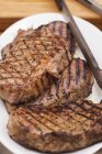 Grilled beef steaks — Stock Photo