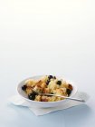 Bread and butter pudding with blueberries — Stock Photo