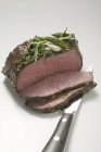 Partly carved Roasted beef — Stock Photo