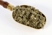 Dried Chinese mugwort in a scoop — Stock Photo