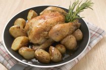 Roasted Chicken with potatoes — Stock Photo