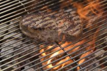 Beef steak on barbecue — Stock Photo