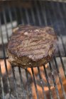 Beef steak on barbecue — Stock Photo