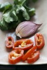 Garlic clove and sliced chilli — Stock Photo