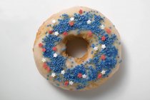 Doughnut with sprinkles and stars — Stock Photo
