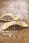 Truffle ravioli pasta cut in halves — Stock Photo