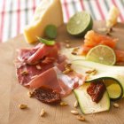 Ham with courgette and dried tomatoes — Stock Photo