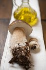 Ceps in front of a carafe — Stock Photo
