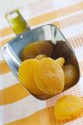 Dried apricots in scoop — Stock Photo