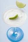 Margarita with lime wedges — Stock Photo