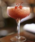 Glass of cherry cocktail — Stock Photo