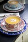Pepper soup with chilli sour cream — Stock Photo