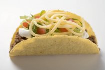 Taco filled with mince — Stock Photo