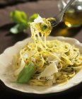 Spaghetti with basil and Parmesan — Stock Photo