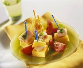 Cheese and ham on cocktail sticks — Stock Photo
