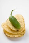 Tortilla chips with green Jalapeo chilli — Stock Photo