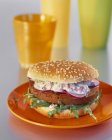 Burger with arugula and radishes — Stock Photo