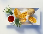 Popia - Thai spring rolls with white cabbage filling on white plate — Stock Photo