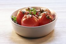 Tomatoes with marjoram and cheese — Stock Photo