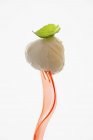 Mozzarella with basil on plastic fork — Stock Photo