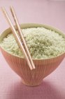 Sticky rice in pink bowl — Stock Photo