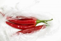 Chili peppers in plastic bag — Stock Photo