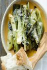 Leeks with grated cheese — Stock Photo