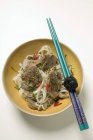 Rice noodles with pork fillets — Stock Photo