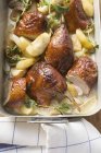 Roast duck pieces with apples — Stock Photo