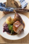 Duck with red cabbage and potato dumpling — Stock Photo