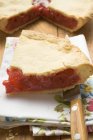 Cherry pie slice on napkin — Stock Photo