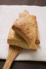 Triangular sweet puff pasties — Stock Photo